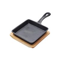 Mini poêle en fonte 15 x 11 cm avec support bois - Visuel 0
