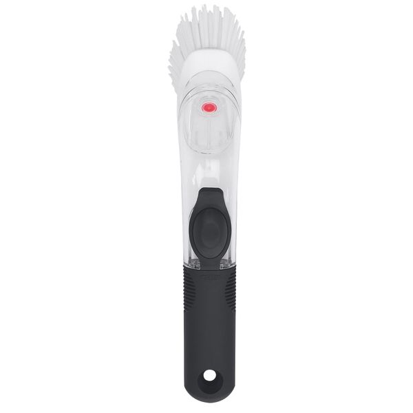 Brosse avec réservoir